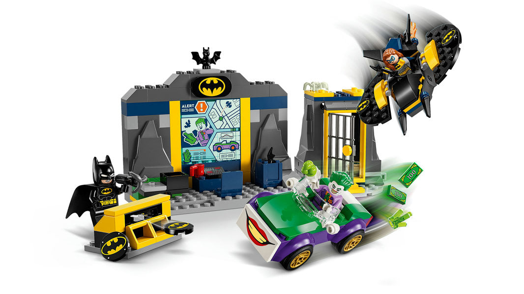 THE BATCAVE WITH BATMAN, BATGIRL AND THE JOKER